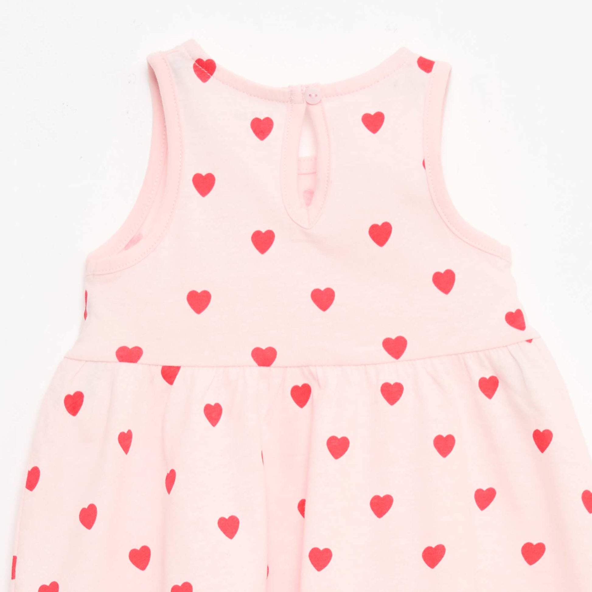 Sleeveless dress with message PINK